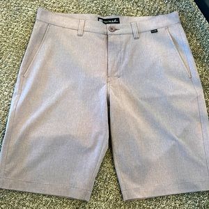 Men’s very light maroon Travis Mathew shorts size 33.